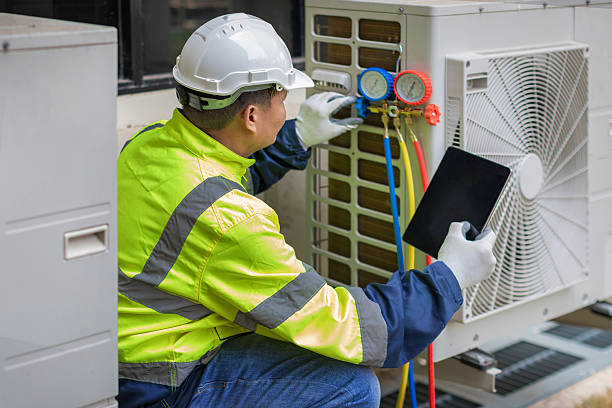 Professional Ac Installation technician working in Mount Rainier, MD